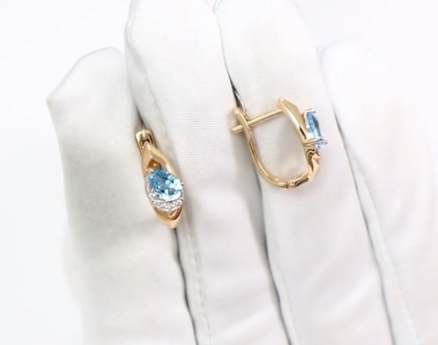 Ohrringe mit Swiss Blue Topas und Zirkonia Russisches Rotgold 585 Art. Nr. 725962