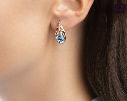 Ohrringe mit Swiss Blue Topas und Zirkonia Rotgold 585 Art. Nr. 727288