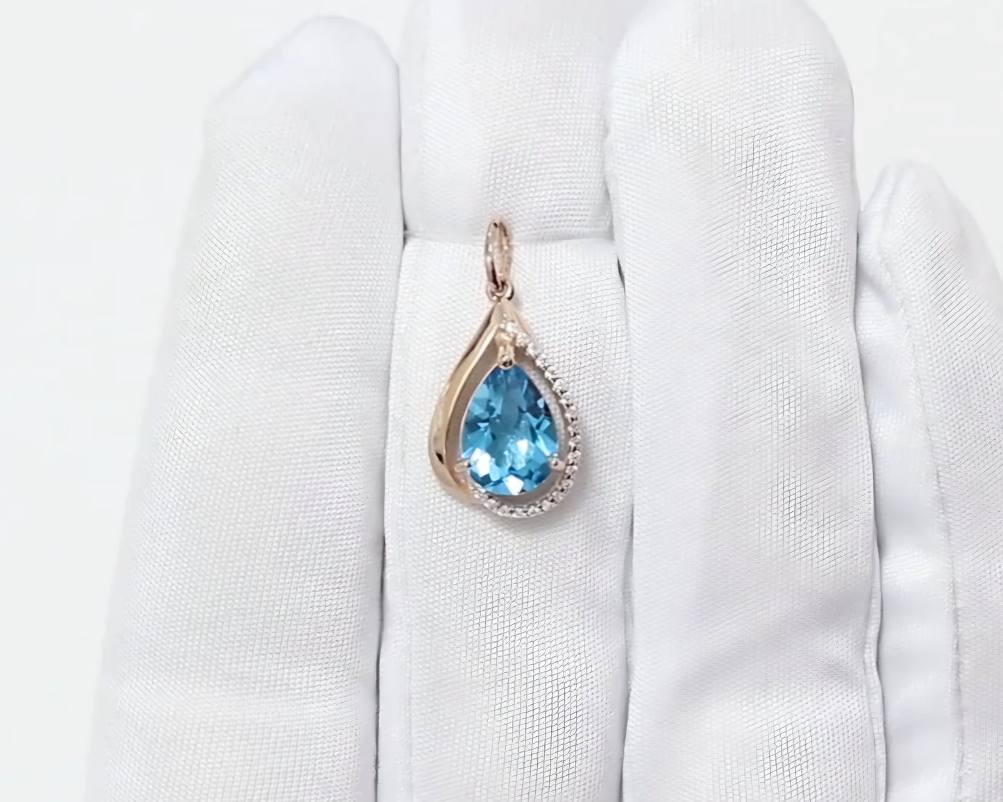 Anhänger mit Swiss Blue Topas und Zirkonia Russisches Rotgold 585 Art. Nr.731894