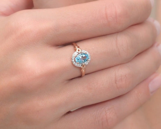 Ring mit Swiss Blue Topas und Zirkonia Rotgold 585 Art. Nr. 715070