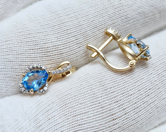 Ohrringe mit Swiss Blue Topas und Zirkonia Rotgold 585 Art. Nr. 723908