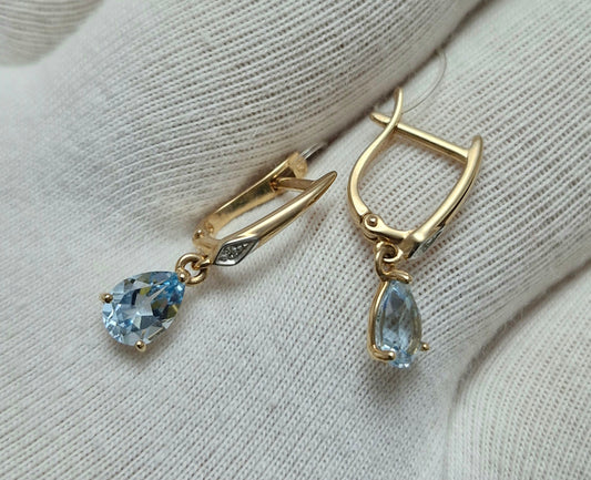 Ohrringe mit Sky Blue Topas und Brillanten Rotgold 585 Art. Nr. 72-00022