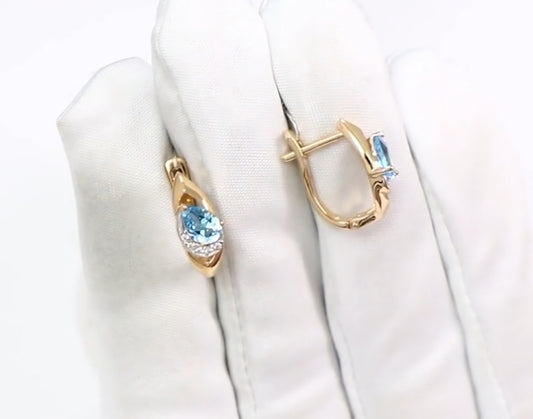 Ohrringe mit Swiss Blue Topas und Zirkonia Russisches Rotgold 585 Art. Nr. 725962