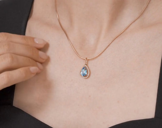 Anhänger mit Swiss Blue Topas und Zirkonia Russisches Rotgold 585 Art. Nr.731894