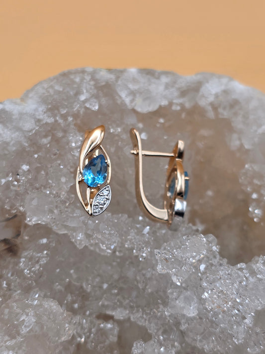 Ohrringe mit Swiss Blue Topas und Brillanten Rotgold 585 Art. Nr. 64006SBT